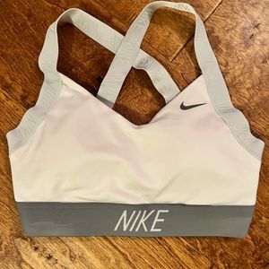 Small white and grey Nike sports bra